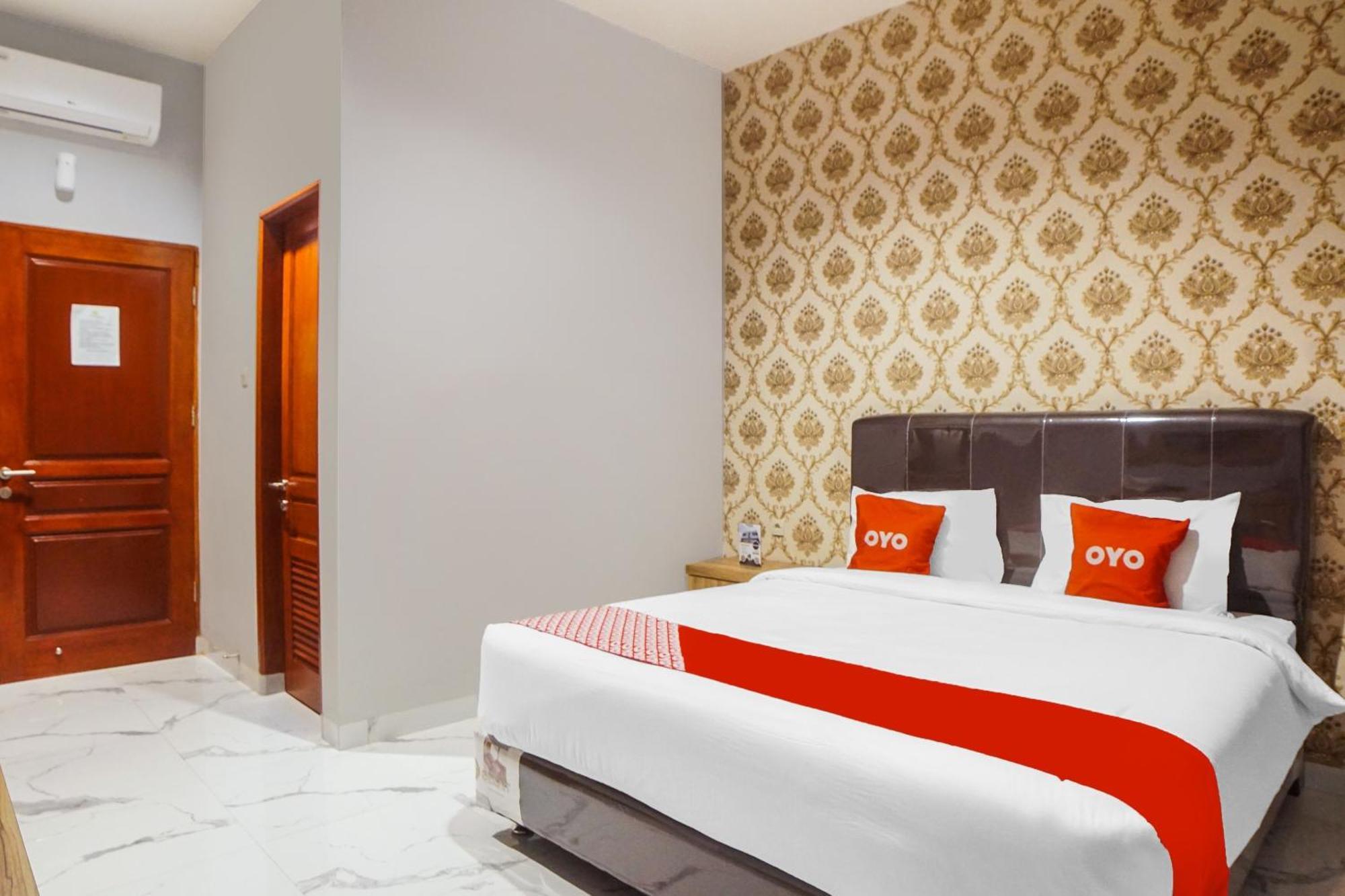 Super Oyo Capital O 92066 Papakoel Hotel & Cafe Medan Extérieur photo